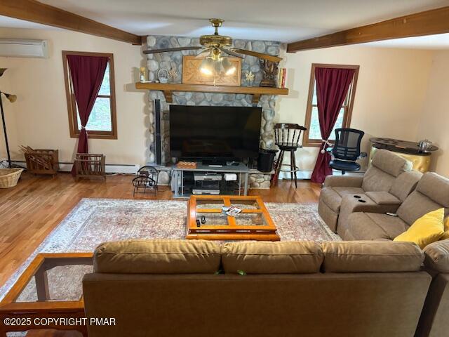 893 Millcreek Road Newfoundland, PA 18445 - Photo 7 of 31 a living room with furniture and a flat screen tv