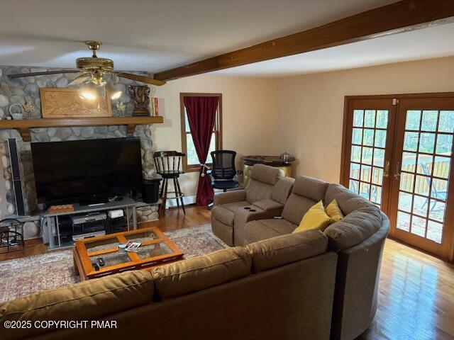 893 Millcreek Road Newfoundland, PA 18445 - Photo 8 of 31 a living room with furniture and a flat screen tv
