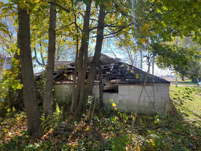 a backyard of a house with lots of green space