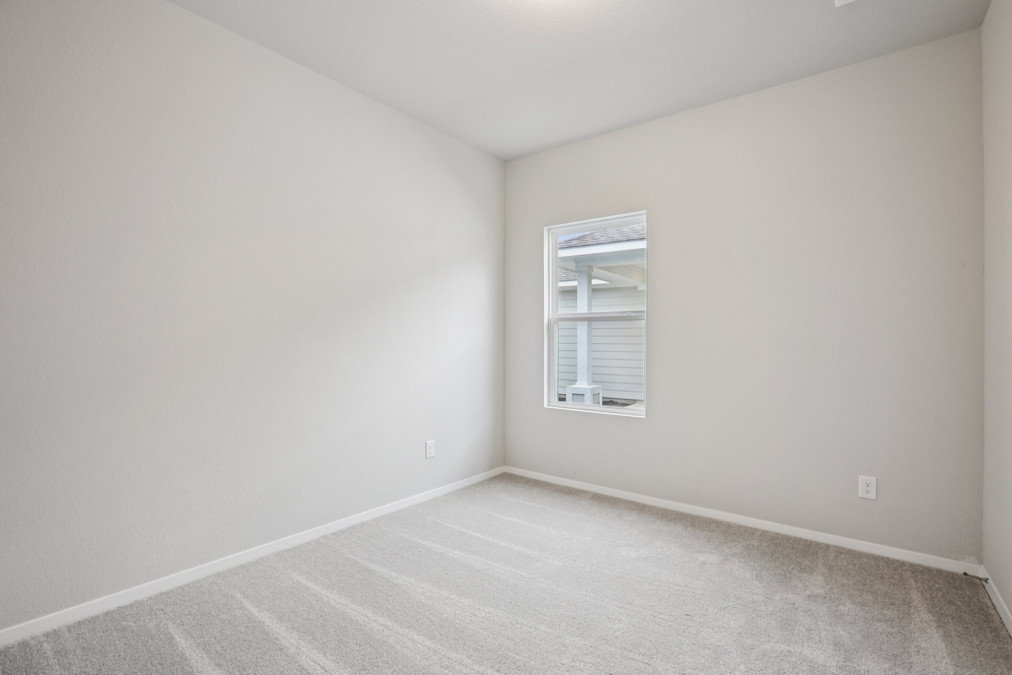 104 Summer Drive Elgin, TX 78621 - Photo 27 of 40 an empty room with windows