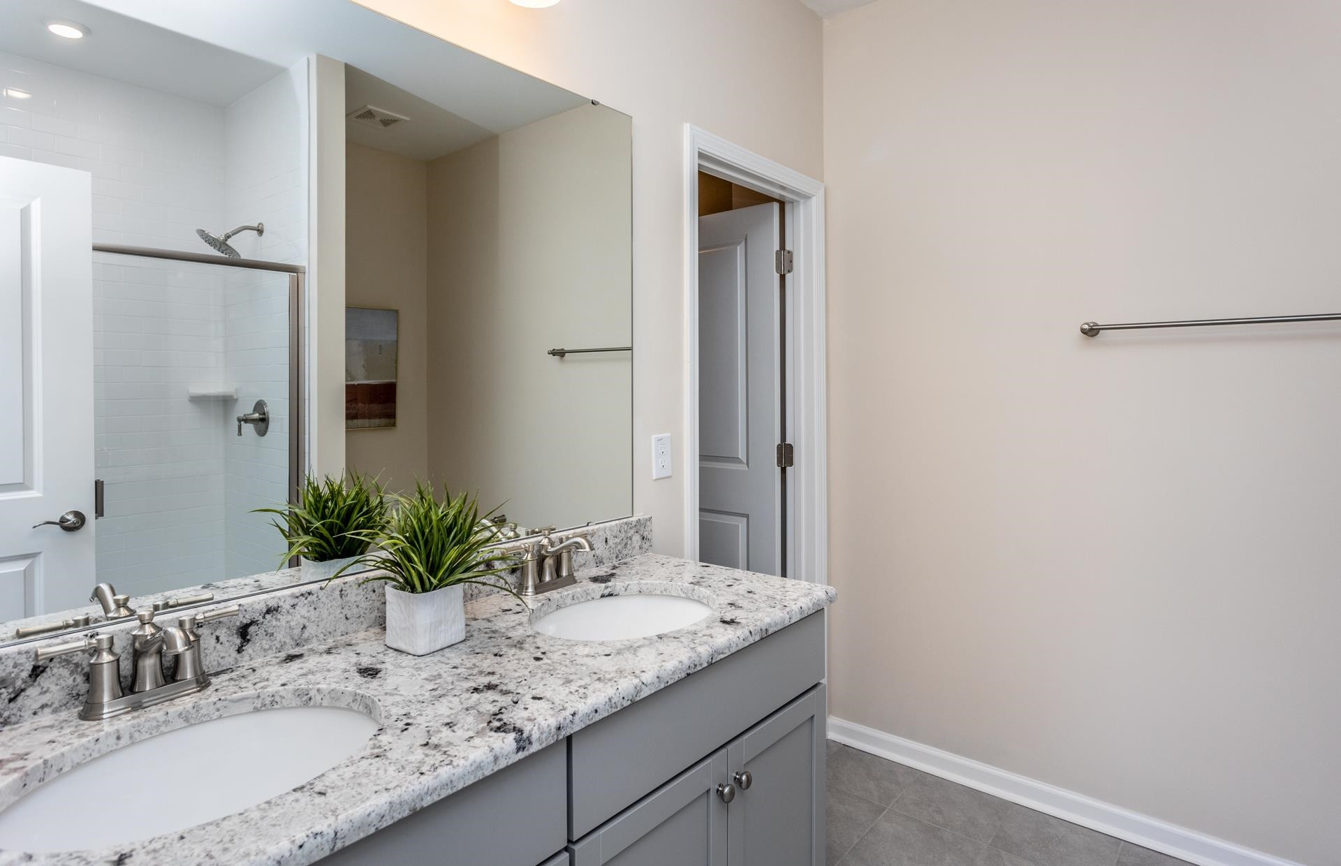 3521 New Town Road Raleigh, NC 27604 - Photo 13 of 18 a bathroom with a granite countertop sink and a mirror