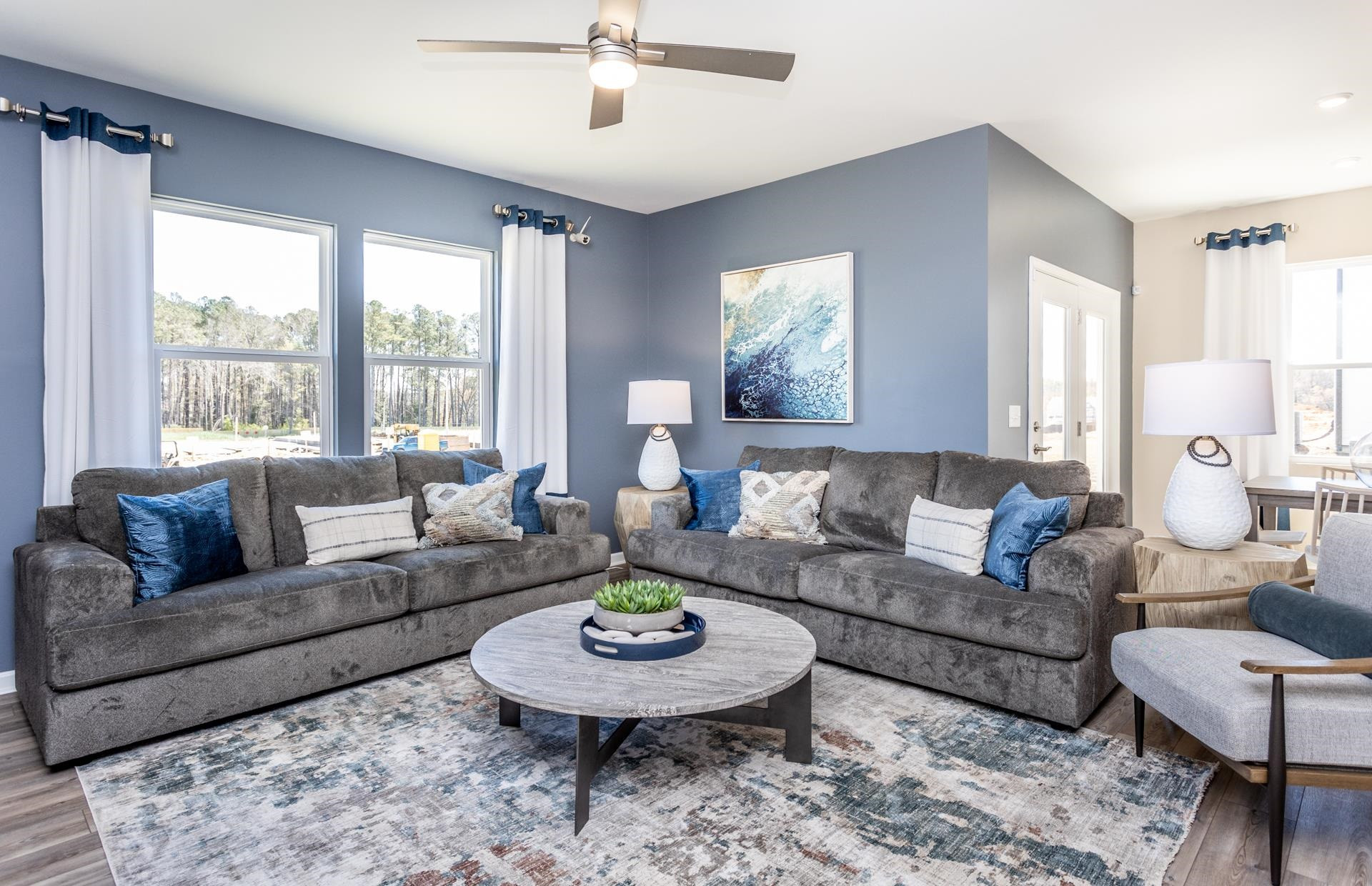 3521 New Town Road Raleigh, NC 27604 - Photo 3 of 18 a living room with furniture and a large window