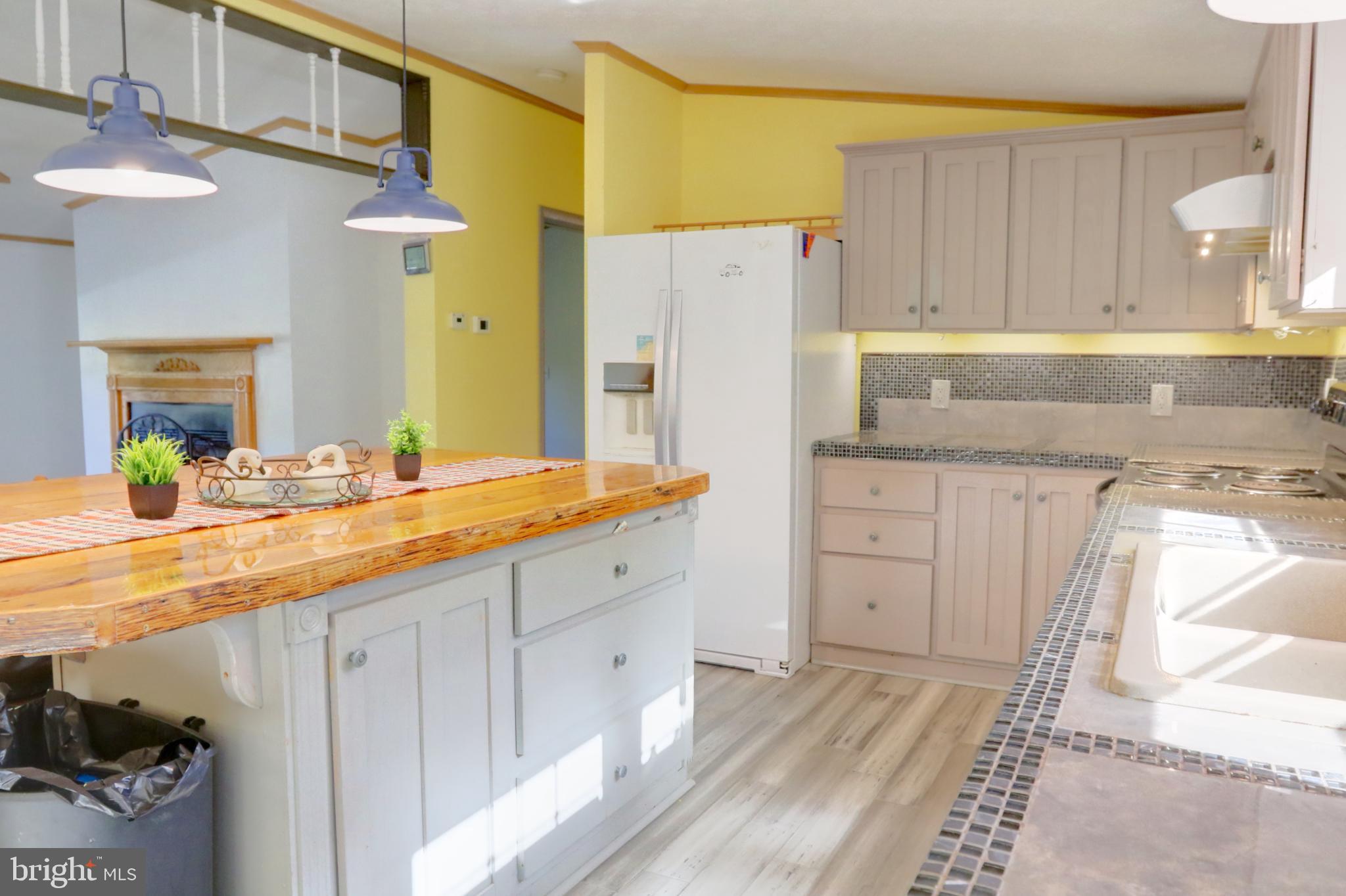 15792 Cross Mill Road Felton, PA 17322 - Photo 18 of 33 a spacious bathroom with a granite countertop sink and a mirror