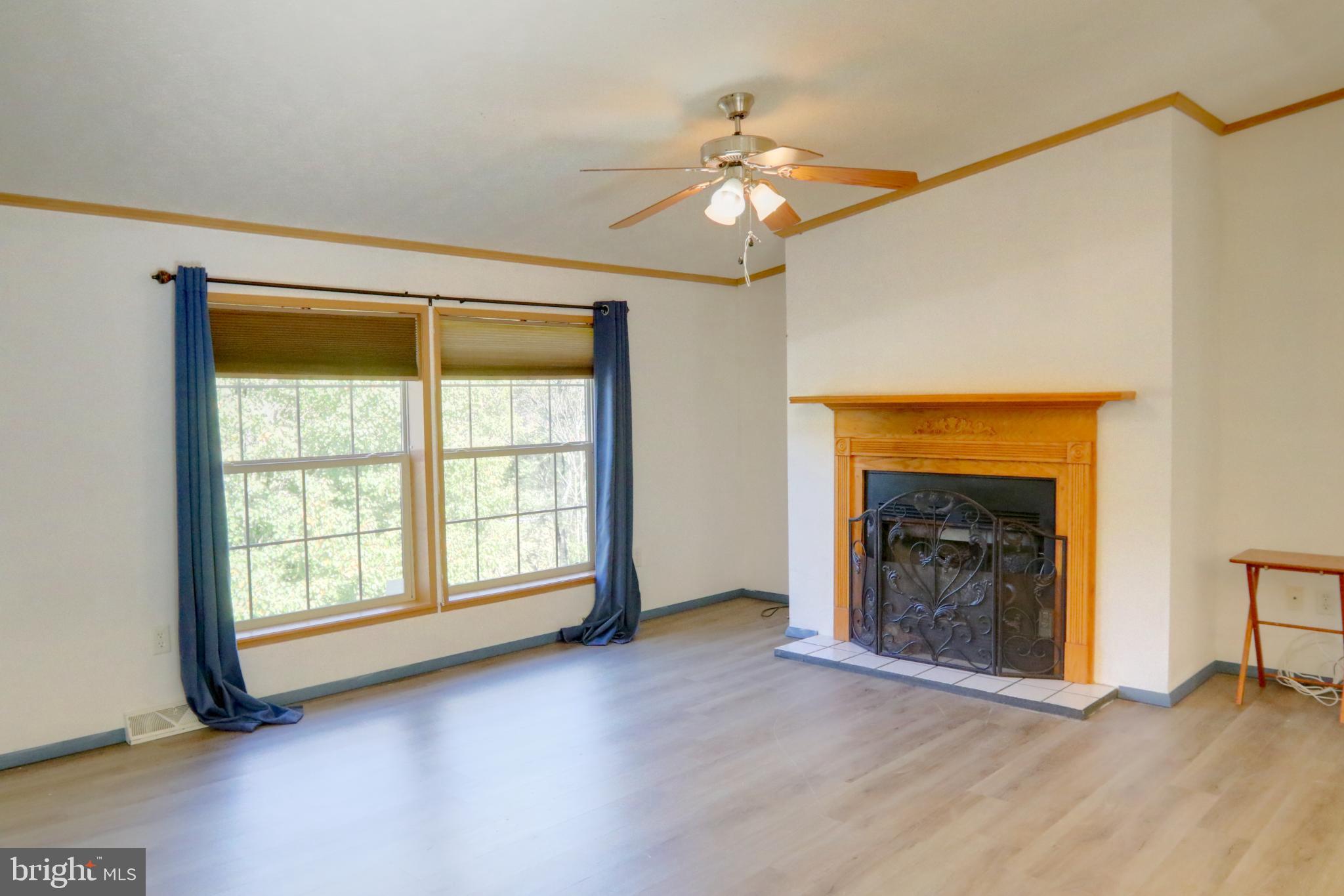15792 Cross Mill Road Felton, PA 17322 - Photo 22 of 33 a view of an empty room with window and fire place