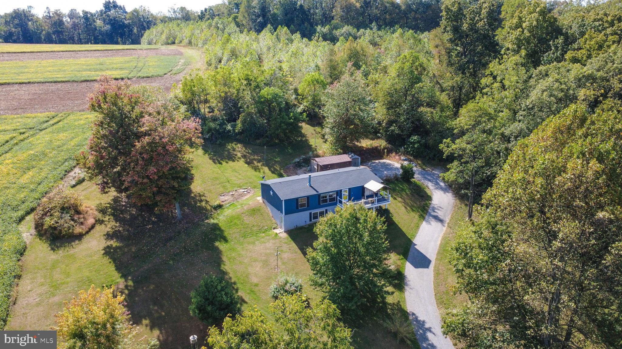 15792 Cross Mill Road Felton, PA 17322 - Photo 3 of 33 an aerial view of a house with a yard basket ball court and outdoor seating