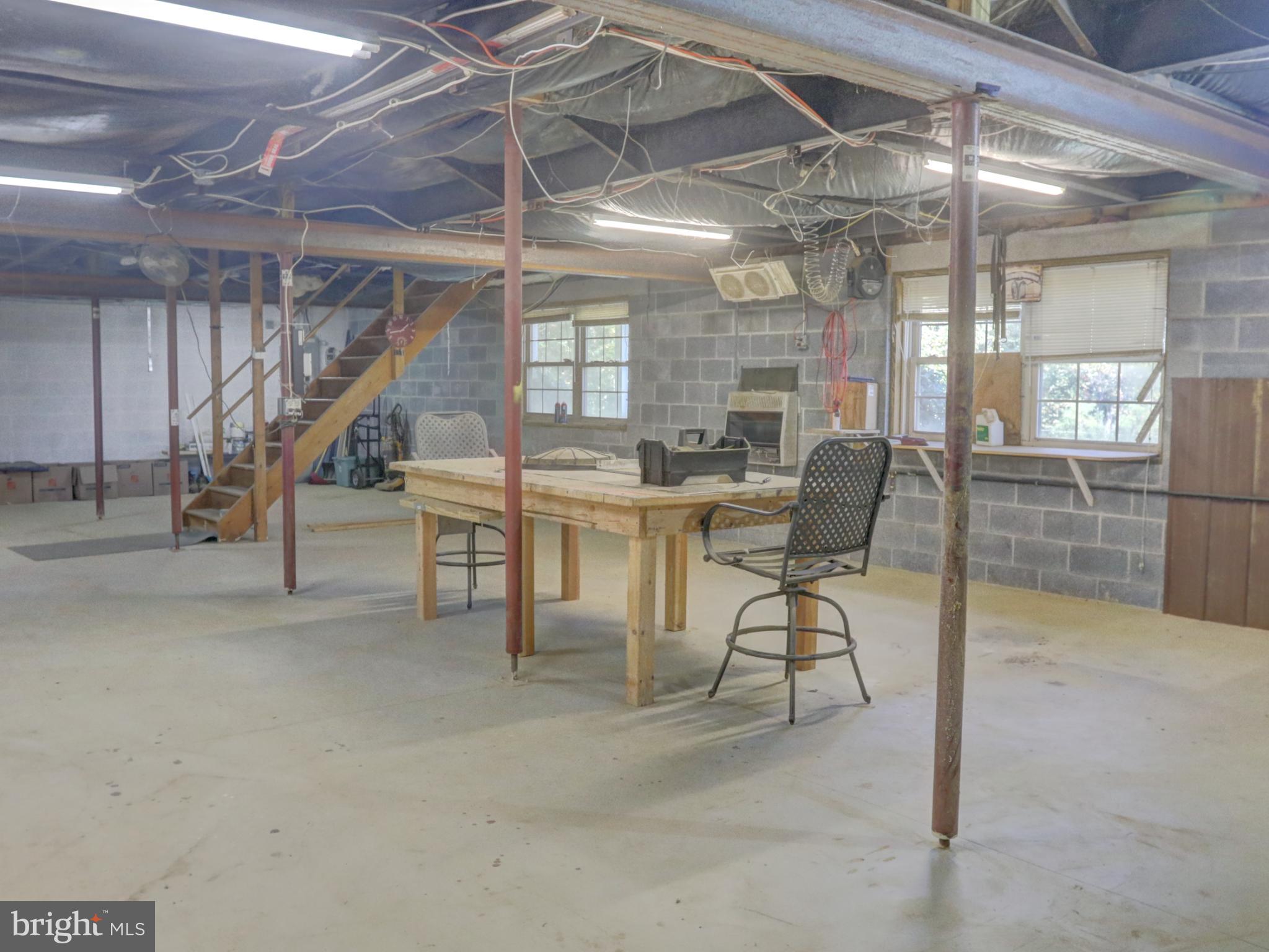 15792 Cross Mill Road Felton, PA 17322 - Photo 31 of 33 a dining room with furniture and a chandelier