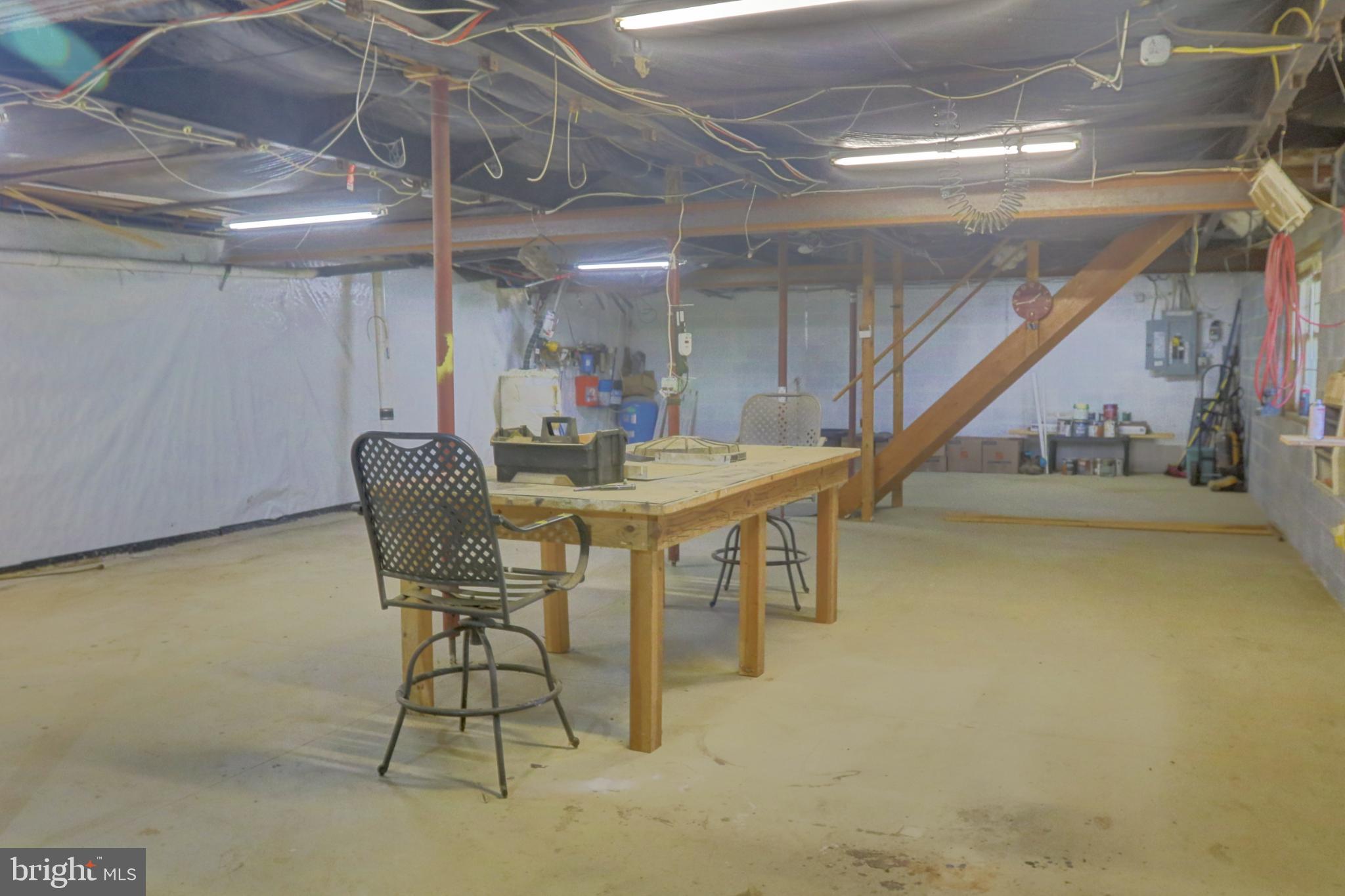 15792 Cross Mill Road Felton, PA 17322 - Photo 32 of 33 a dining room with furniture and a floor to ceiling window
