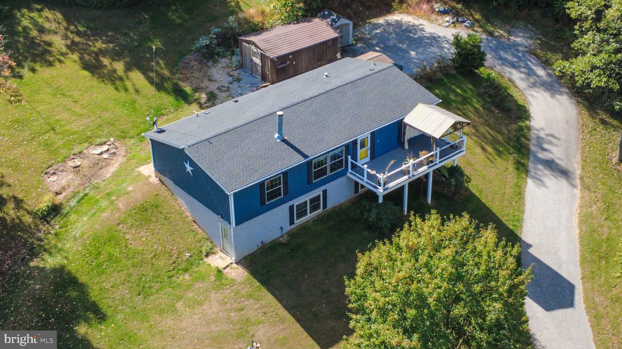 15792 Cross Mill Road Felton, PA 17322 - Photo 5 of 33 an aerial view of a house with a yard basket ball court and outdoor seating