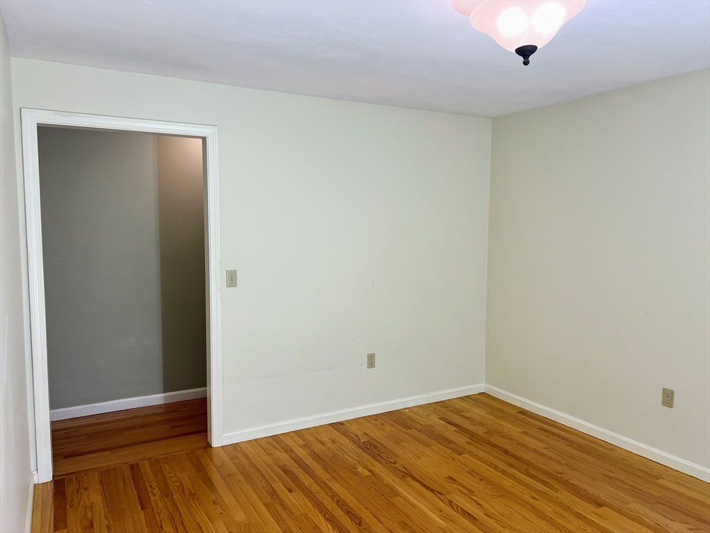 1565 West Street Wrentham, MA 02093 - Photo 16 of 41 a view of room with wooden floor