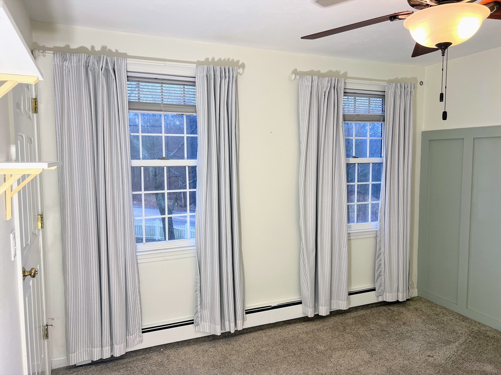 1565 West Street Wrentham, MA 02093 - Photo 21 of 41 a view of empty room with window and cabinet