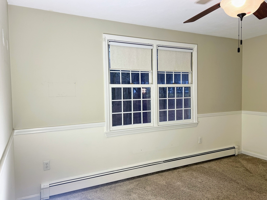 1565 West Street Wrentham, MA 02093 - Photo 22 of 41 a view of an empty room with a window