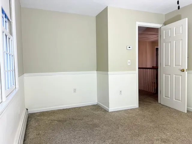 a view of front door with hallway