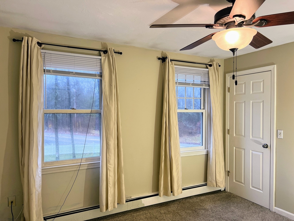 1565 West Street Wrentham, MA 02093 - Photo 31 of 41 a view of front door with hallway