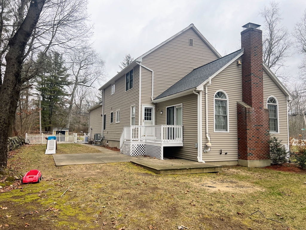 1565 West Street Wrentham, MA 02093 - Photo 35 of 41 a view of a house with backyard
