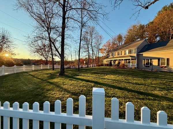 1565 West Street Wrentham, MA 02093 - Photo 40 of 41 a front view of a house with a garden