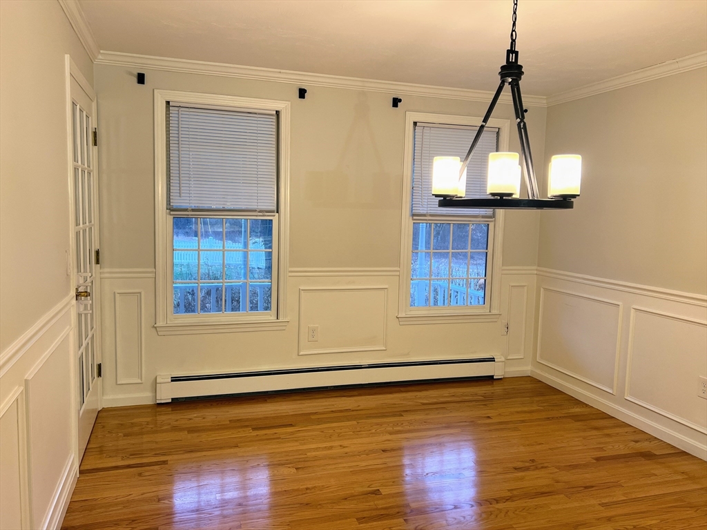 1565 West Street Wrentham, MA 02093 - Photo 6 of 41 a view of a room with wooden floor and windows