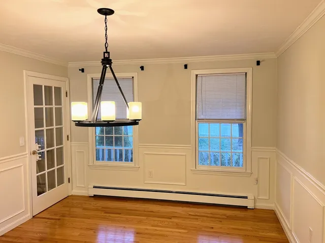 a view of a house with a wooden floor and a window