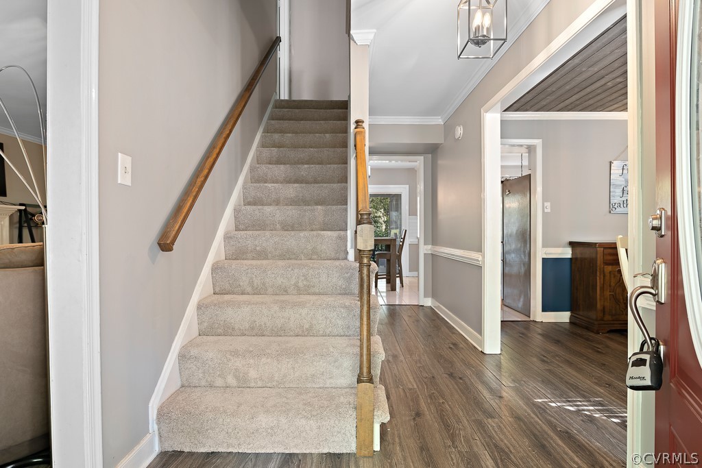 13906 Turtle Hill Road Midlothian, VA 23112 - Photo 6 of 35 a view of an entryway with wooden floor and a livingroom view
