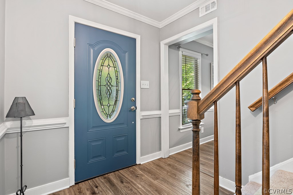 13906 Turtle Hill Road Midlothian, VA 23112 - Photo 7 of 35 a view of an entryway with wooden floor door and a living room