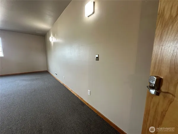 an empty room with windows