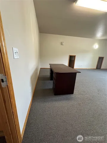 a room with furniture and window