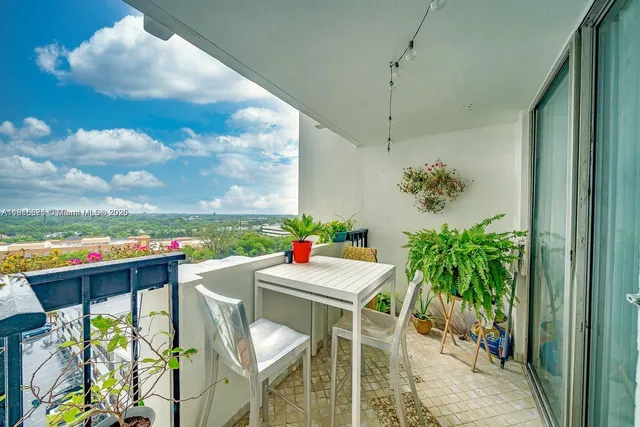 a table that has a table and chairs in it