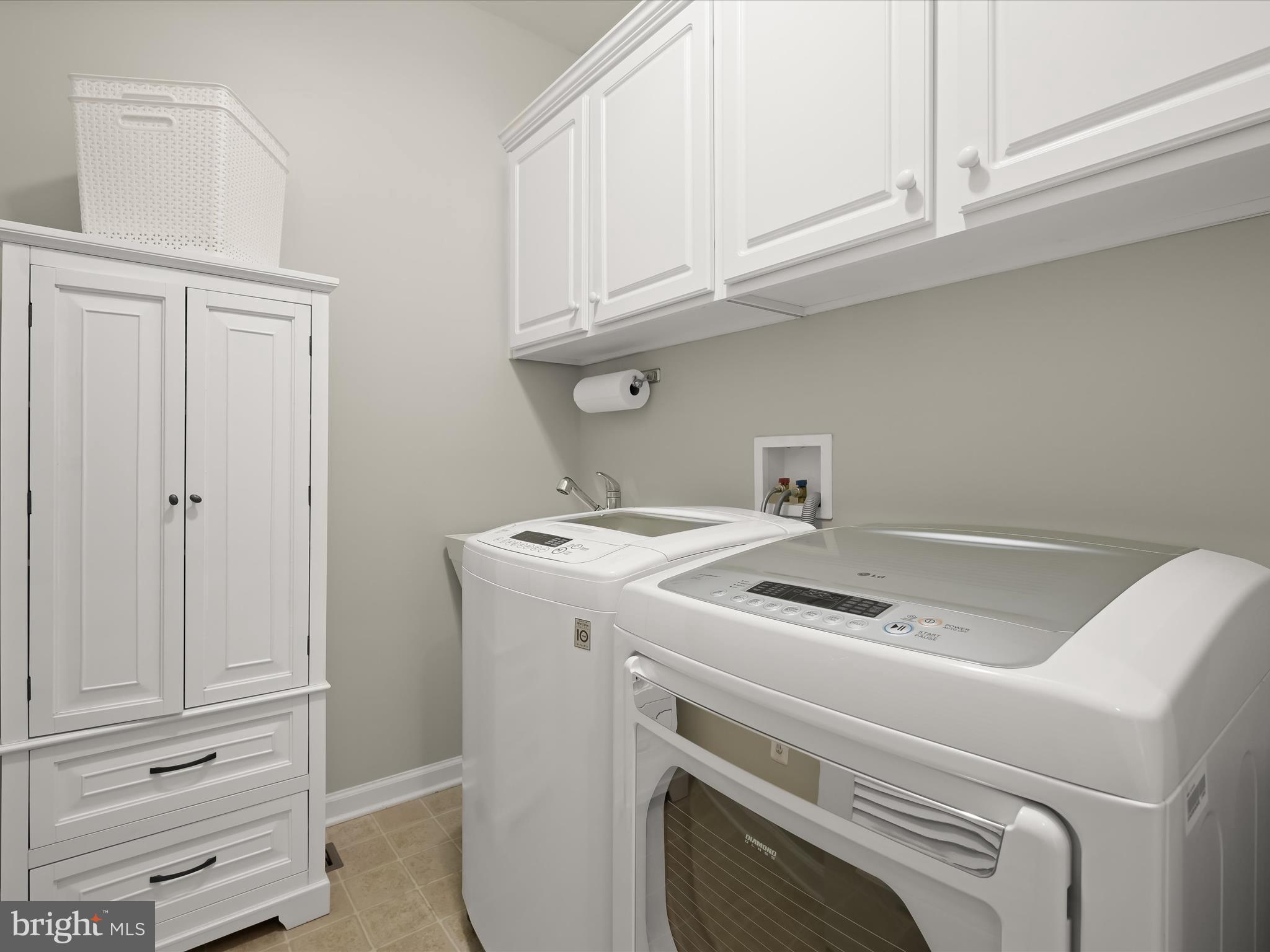 8214 Academy Road, Unit 25 Ellicott City, MD 21043 - Photo 32 of 64 Entry level laundry room with newer W&D