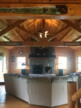 944 George Hill Road Lancaster, MA 01523 - Photo 17 of 22 a living room with furniture and a floor to ceiling window