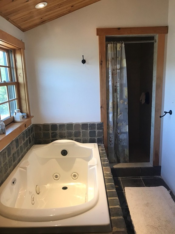 944 George Hill Road Lancaster, MA 01523 - Photo 7 of 22 a bathroom with bathtub and shower