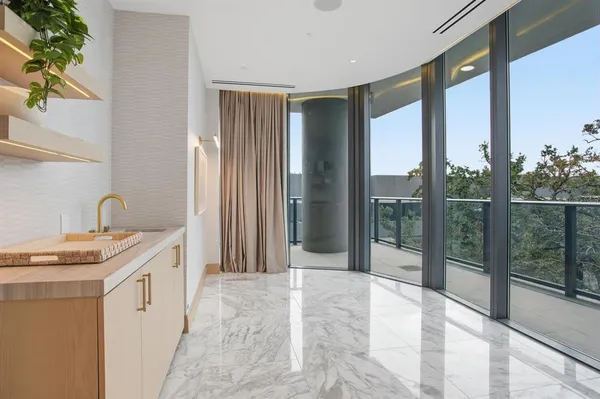 a view of a hallway with closet area