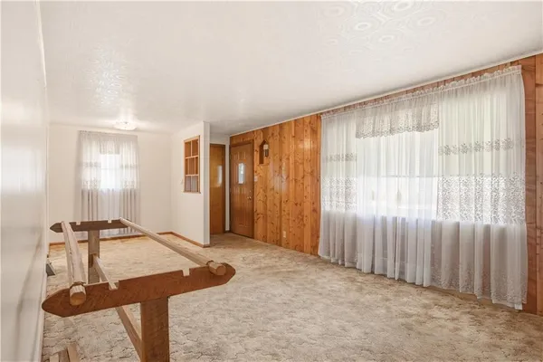 a view of a room with windows