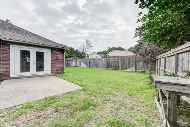 a house view with a garden space