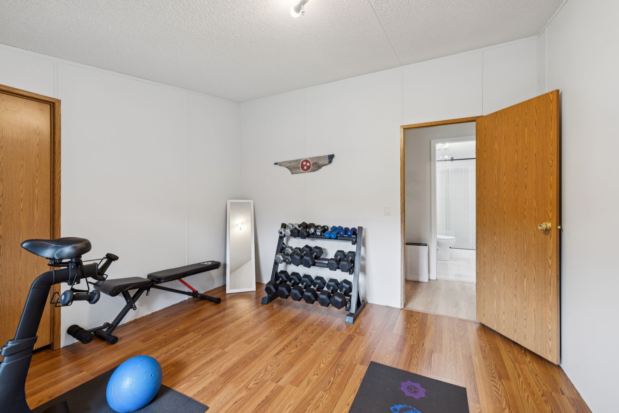 3680 Clark Road Lewisburg, TN 37091 - Photo 31 of 37 a bedroom with bed and wooden floor