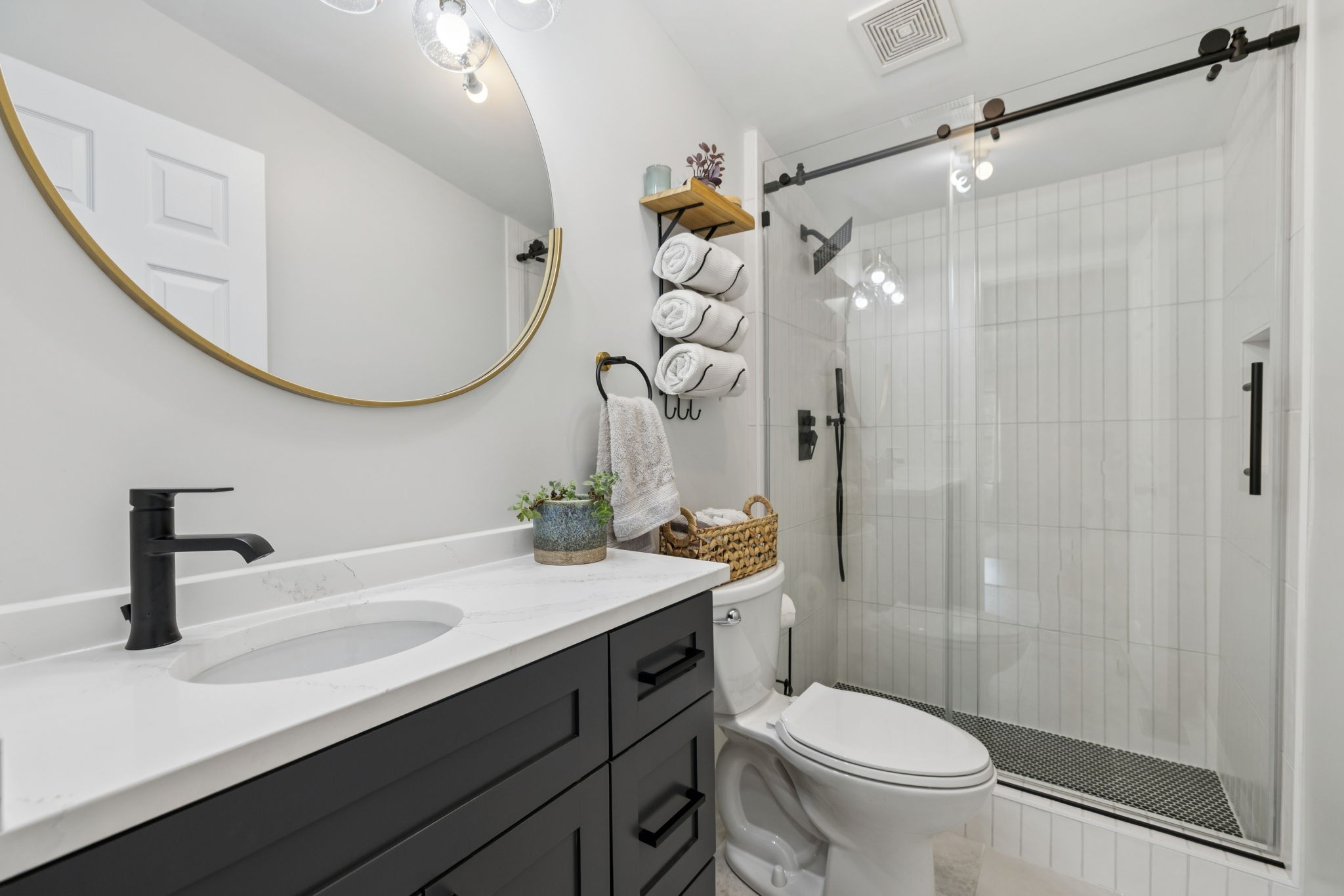 3680 Clark Road Lewisburg, TN 37091 - Photo 33 of 37 a bathroom with a sink a toilet and a mirror