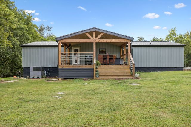 a view of a room with wooden floor and balcony