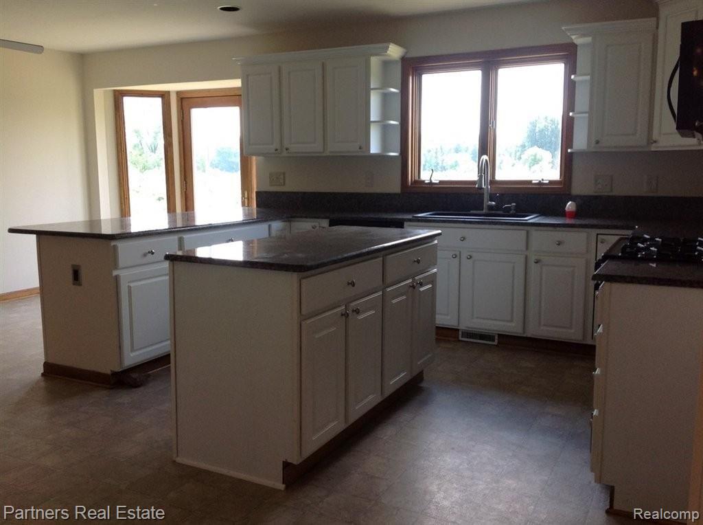 6817 West Lange Road Fowlerville, MI 48836 - Photo 4 of 21 Granite Counters