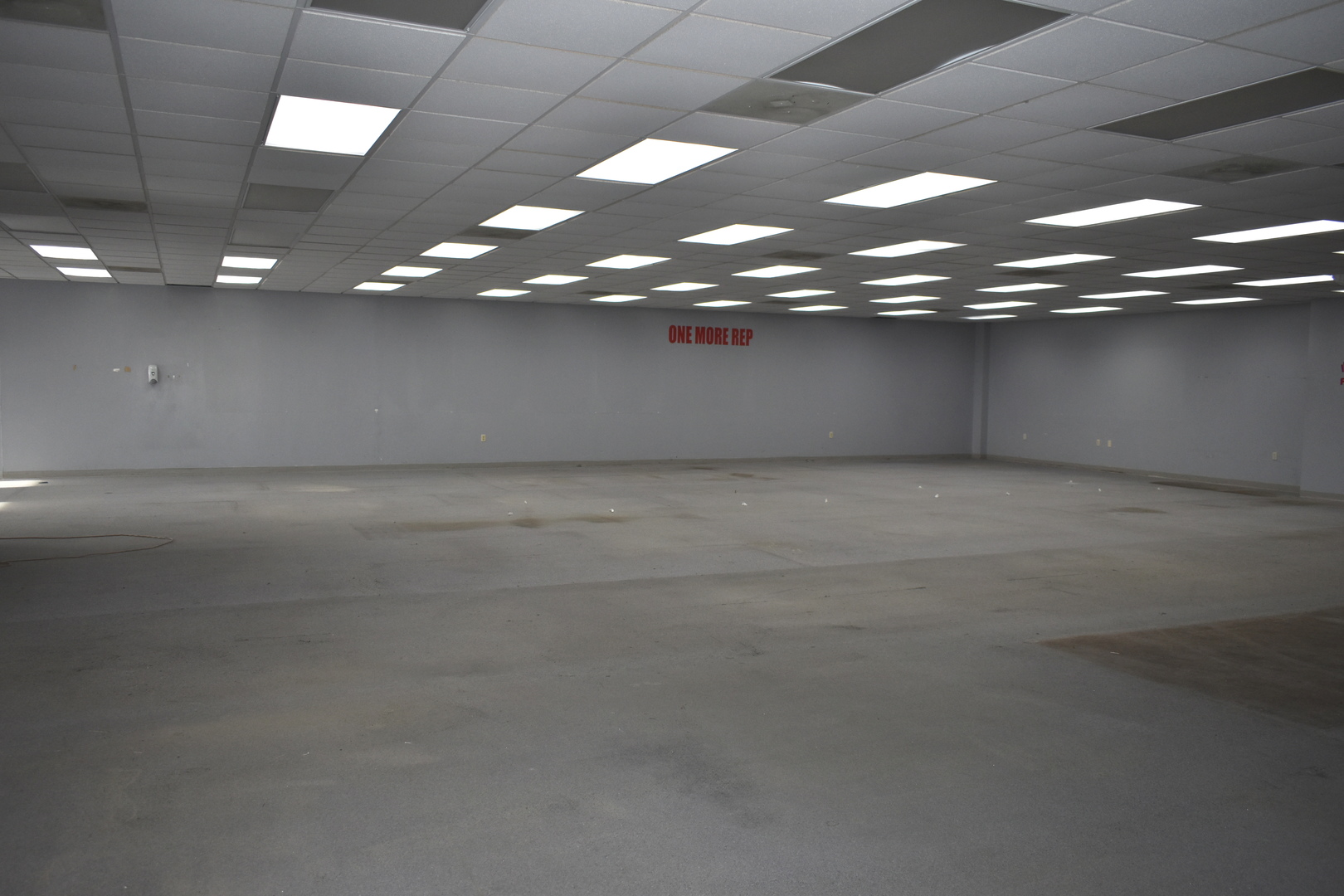 901 West Main Street El Paso, IL 61738 - Photo 9 of 16 an empty room with a kitchen