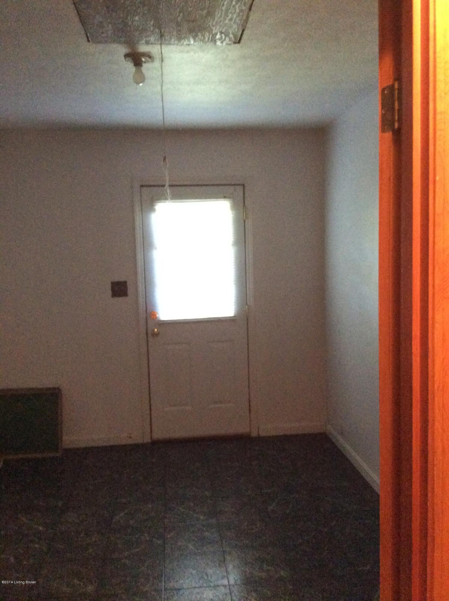 5214 Poplar Level Road Louisville, KY 40219 - Photo 8 of 15 Washer and dryer hook-ups and pull down storage area!