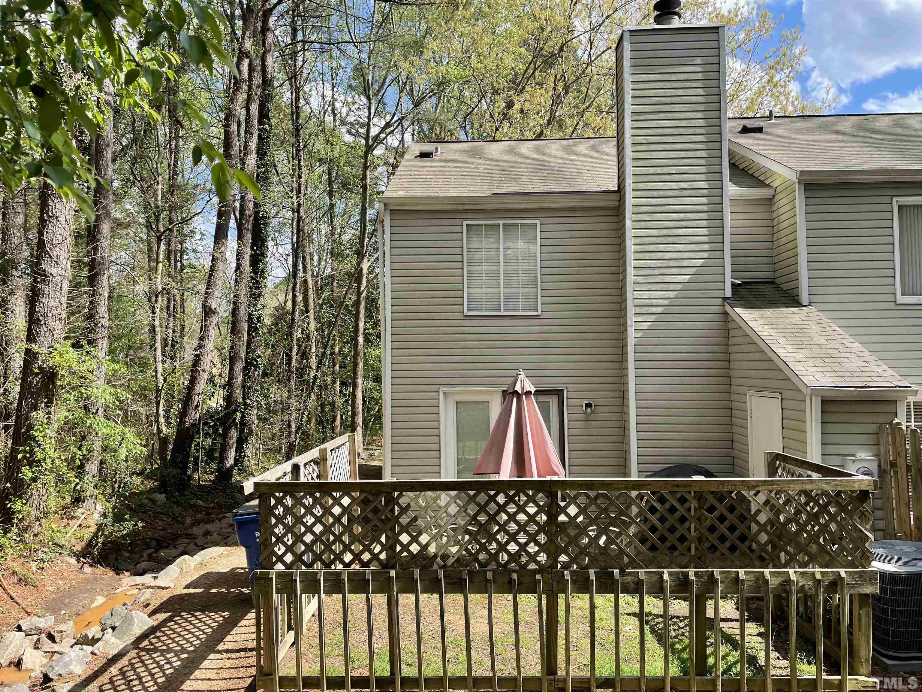 7841 Stephanie Lane Raleigh, NC 27615 - Photo 5 of 37 a view of a house with a garage