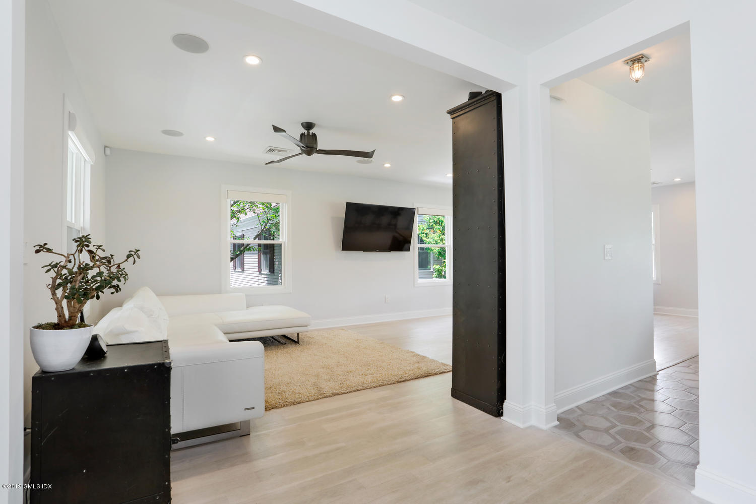 52 Arcadia Road Old Greenwich, CT 06870 - Photo 3 of 28 a view of living room with a flat screen tv