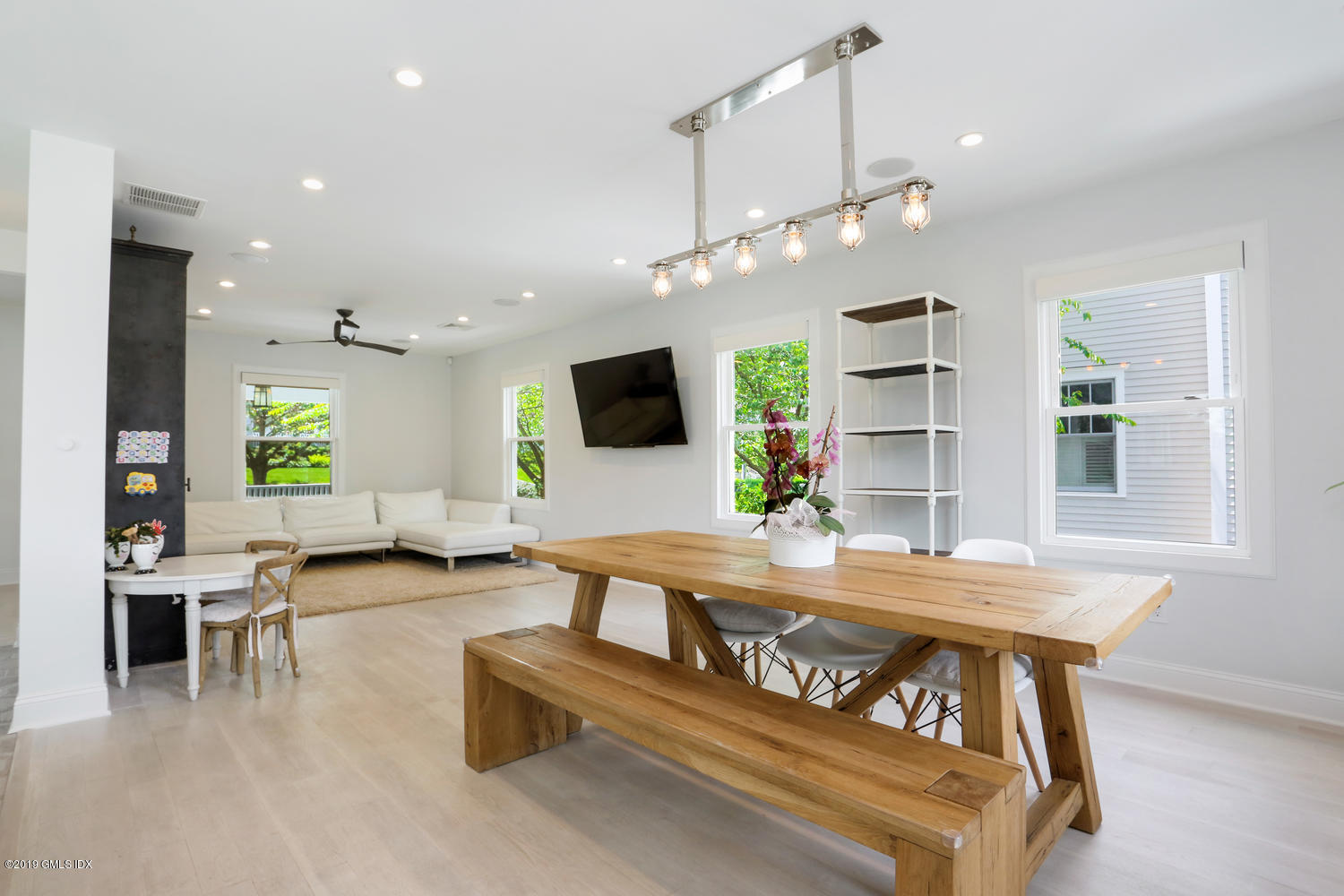 52 Arcadia Road Old Greenwich, CT 06870 - Photo 6 of 28 a view of a dining room with furniture window and wooden floor