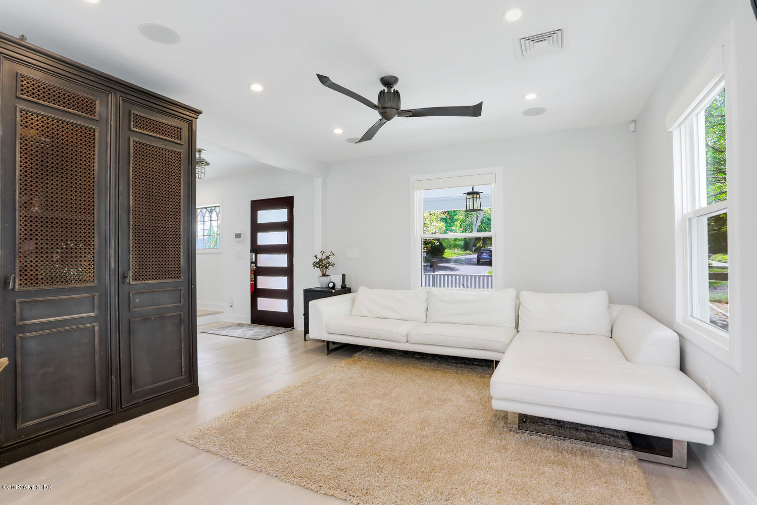52 Arcadia Road Old Greenwich, CT 06870 - Photo 7 of 28 a living room with furniture and a window