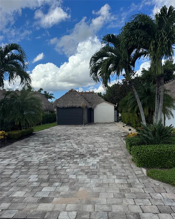 373 Sundial Circle C, Unit 373 Margate, FL 33068 - Photo 18 of 20 a pathway of a yard