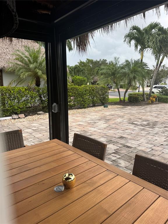 373 Sundial Circle C, Unit 373 Margate, FL 33068 - Photo 4 of 20 a view of a balcony with mountain view and wooden floor