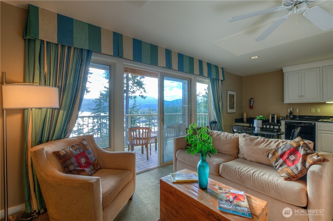 1917 Rosario Road, Unit 2104 Orcas Island, WA 98245 - Photo 3 of 28 a living room with furniture and a large window