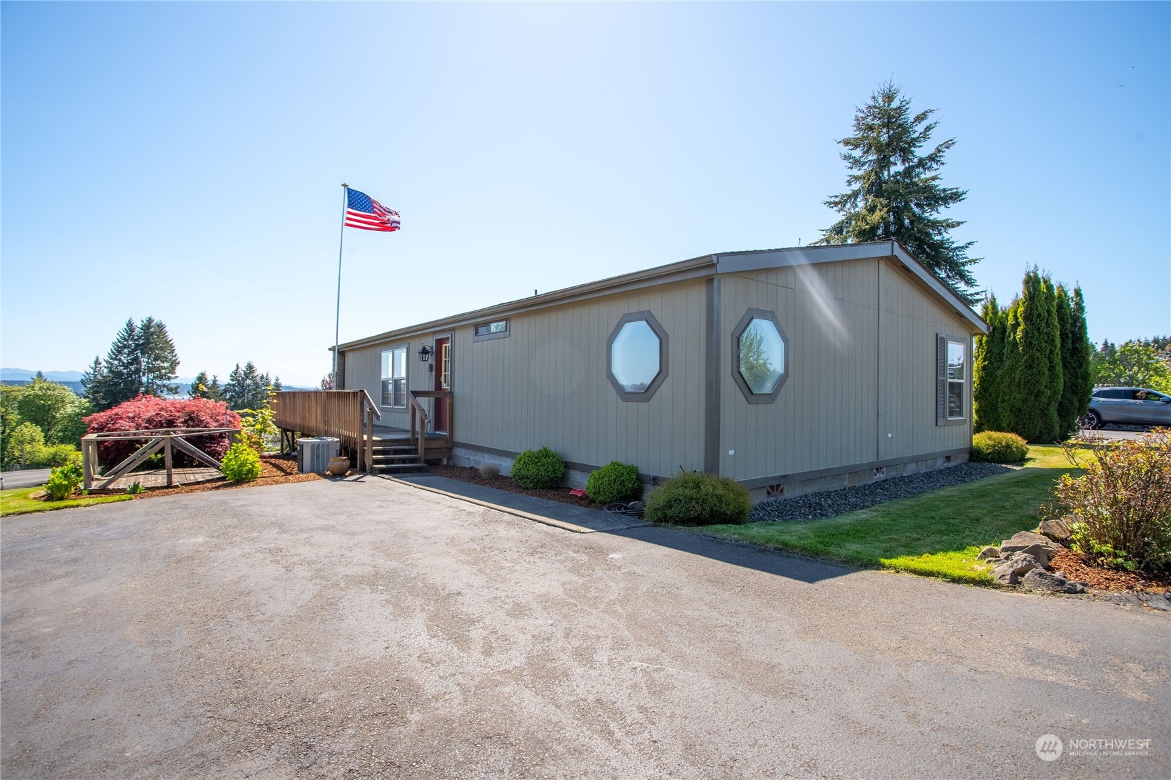 1040 Shorey Road Chehalis, WA 98532 - Photo 2 of 38 a front view of a house with garden and parking
