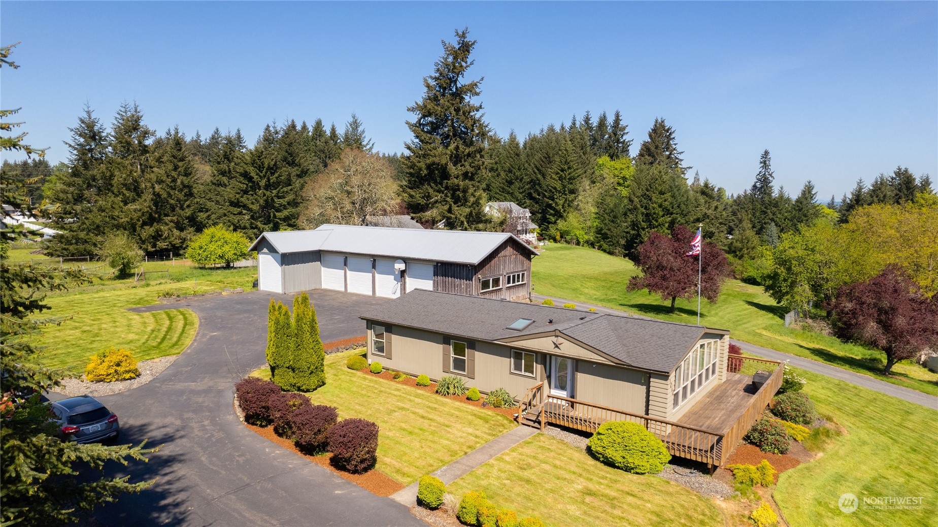 1040 Shorey Road Chehalis, WA 98532 - Photo 21 of 38 an aerial view of a house with swimming pool and big yard