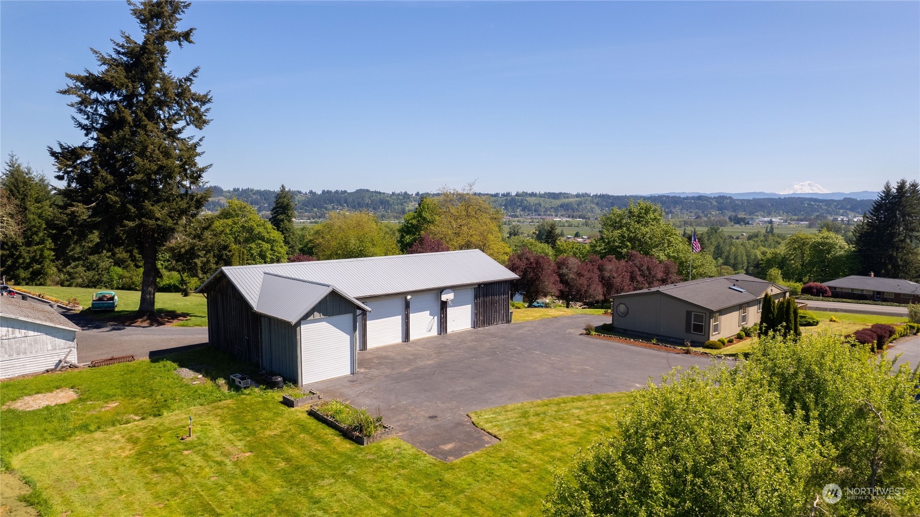1040 Shorey Road Chehalis, WA 98532 - Photo 29 of 38 a view of a house with pool and chairs