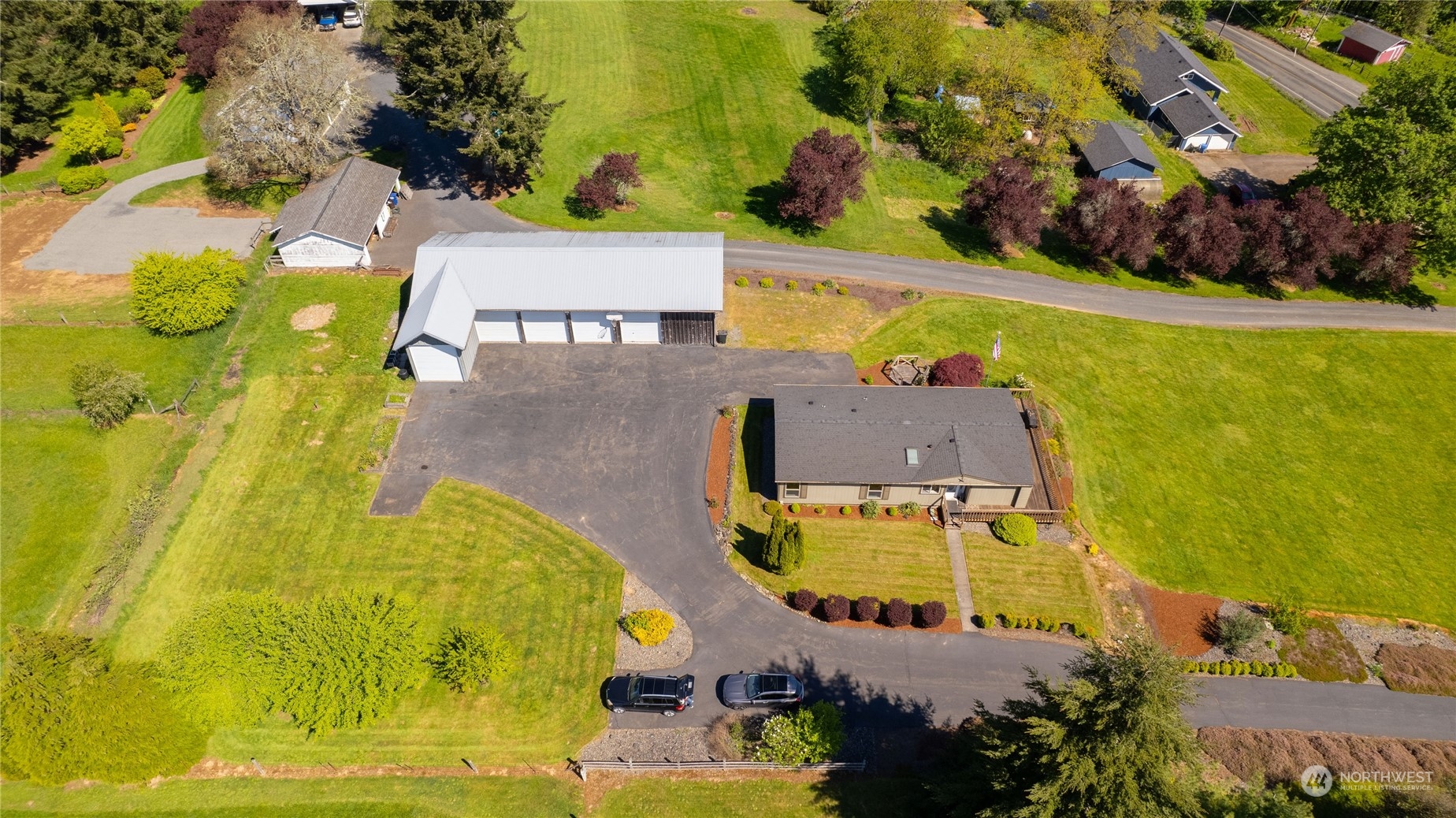 1040 Shorey Road Chehalis, WA 98532 - Photo 32 of 38 an aerial view of a house with swimming pool