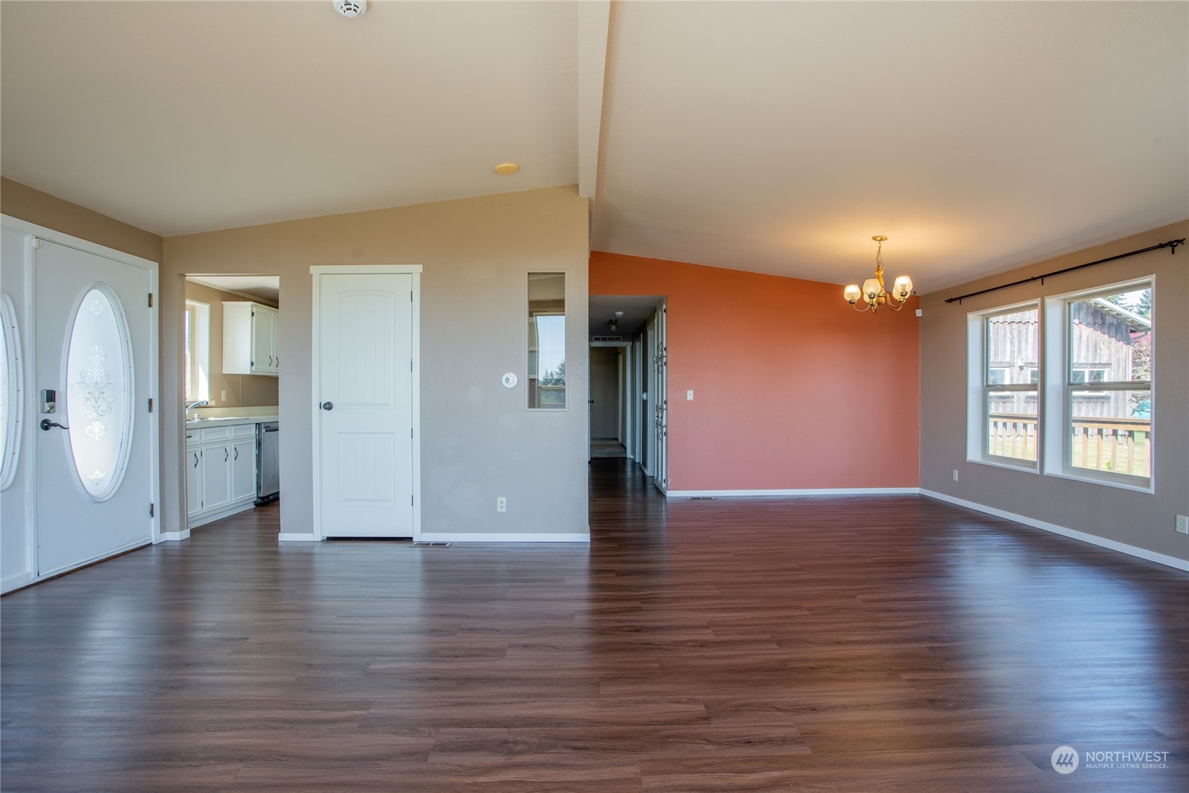 1040 Shorey Road Chehalis, WA 98532 - Photo 8 of 38 a view of an empty room with window and wooden floor